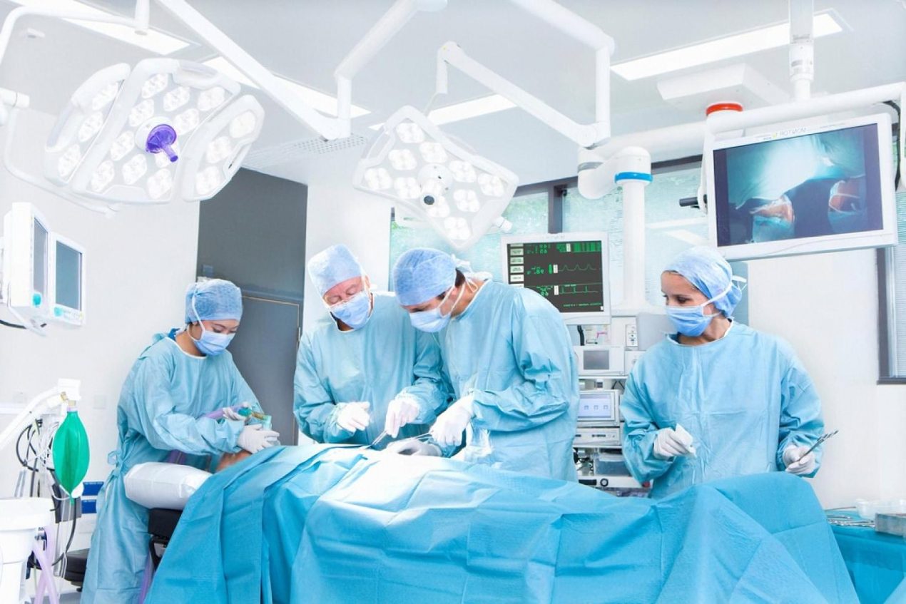 Surgical team performing bariatric surgery in a modern operating theatre